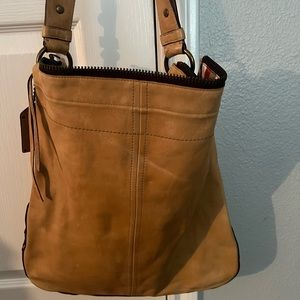 Authentic high end coach Crossbody vachetta leather